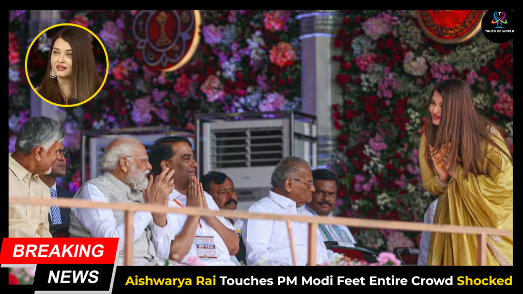Aishwarya Rai touching Prime Minister Narendra Modi’s feet during Sri Sathya Sai Baba centenary event in Puttaparthi.