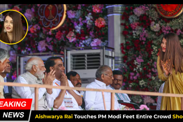 Aishwarya Rai touching Prime Minister Narendra Modi’s feet during Sri Sathya Sai Baba centenary event in Puttaparthi.