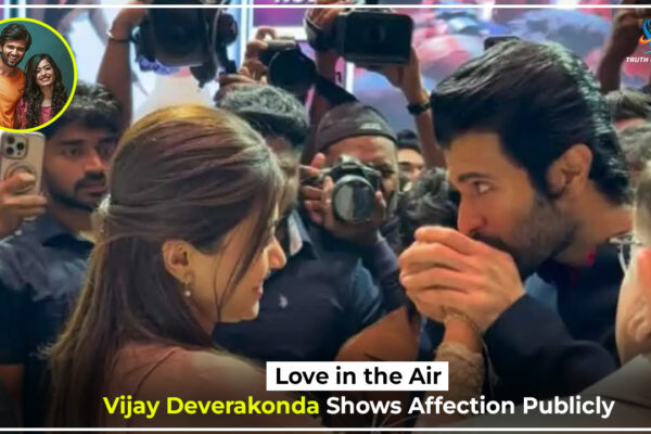 Vijay Deverakonda kisses Rashmika Mandanna’s hand at The Girlfriend success event, marking their first public display of affection after engagement.