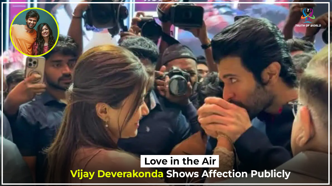 Vijay Deverakonda kisses Rashmika Mandanna’s hand at The Girlfriend success event, marking their first public display of affection after engagement.